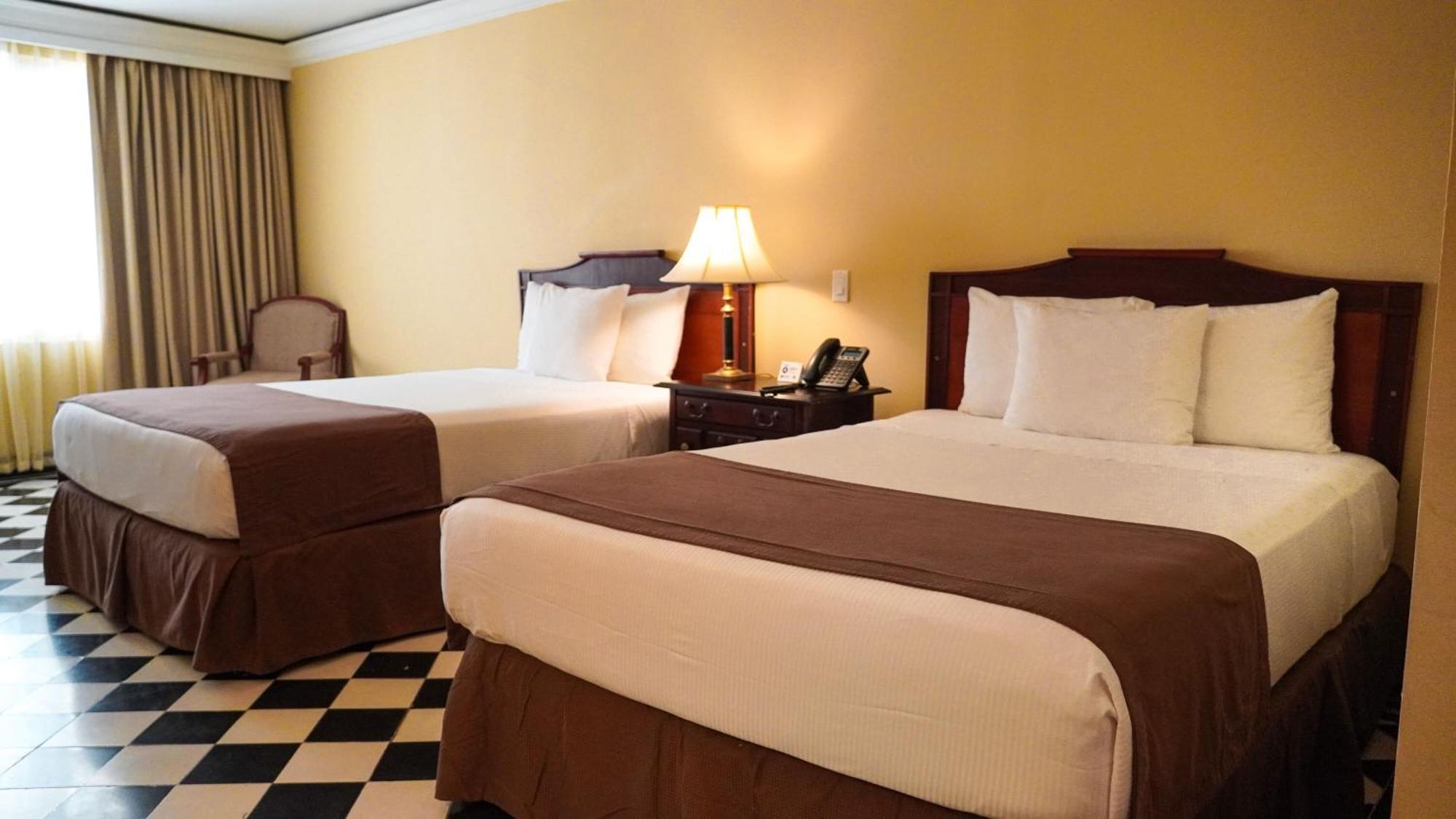 Hotel El Prado Barranquilla  Exteriör bild A room at the hotel